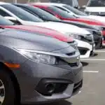 A row of used Honda Accords for sale at a dealership